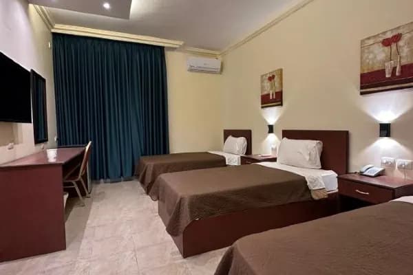 A serene and comfortable Deluxe Single Room at Rumman Hotel