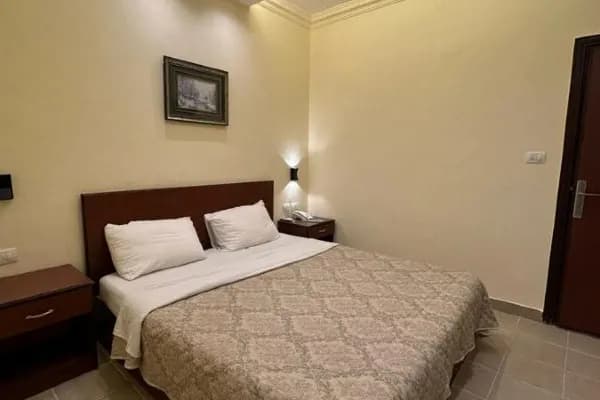 A serene and comfortable Executive Suite at Rumman Hotel